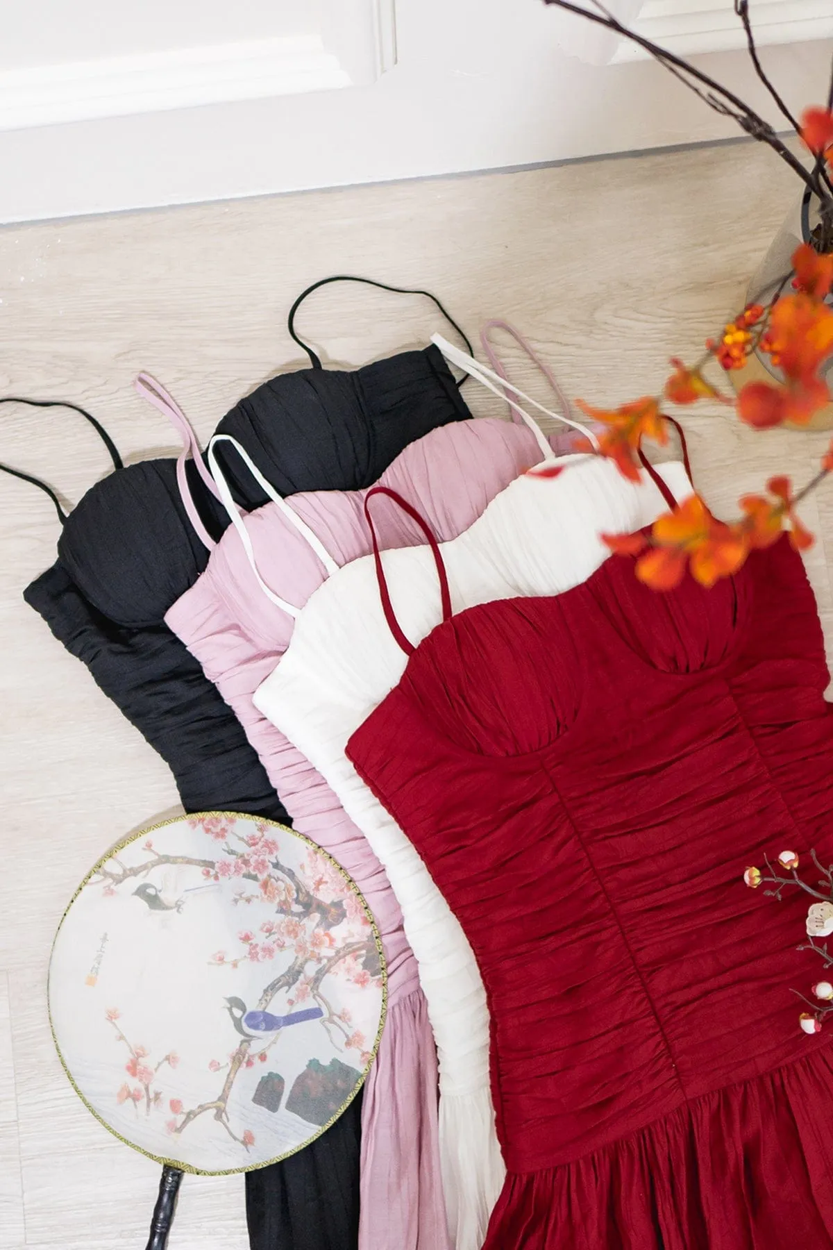 CHANTEL BUSTIER MINI ROMPER DRESS IN WINE RED
